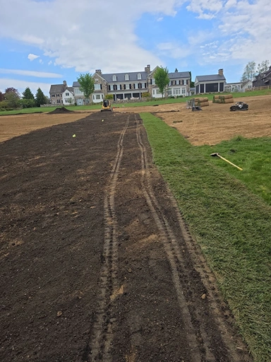 Professional meadow installation preparation on a Bucks County property